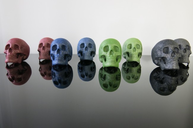 3D printed skull in polished or raw and colored Alumide b