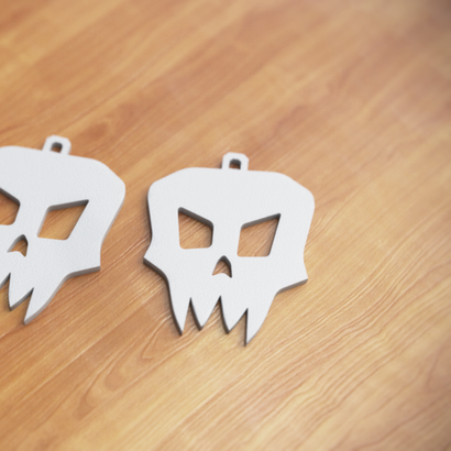 boucle d'oreilles tete de mort