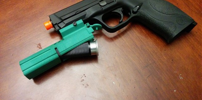 /media/picture/thumb/2015/06/13/CqiK/long-green-version-with-shell-insertion-mounted-on-pistol-small_size_833x413..jpg