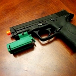 /media/picture/thumb/2015/06/13/xDgS/full-length-green-version-mounted-to-pistol-small_thumbnail_squared_small..jpg