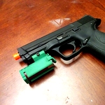 /media/picture/thumb/2015/11/30/zcrC/full-length-green-version-mounted-on-pistol-with-shell-small_thumbnail_squared_small..jpg