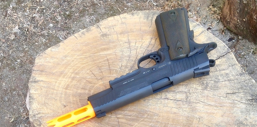 /media/picture/thumb/2019/08/09/NAzt/orange-version-on-colt-1911-tac-top-quarter-small_size_833x413..jpg