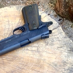 /media/picture/thumb/2019/08/09/NAzt/orange-version-on-colt-1911-tac-top-quarter-small_thumbnail_squared_small..jpg